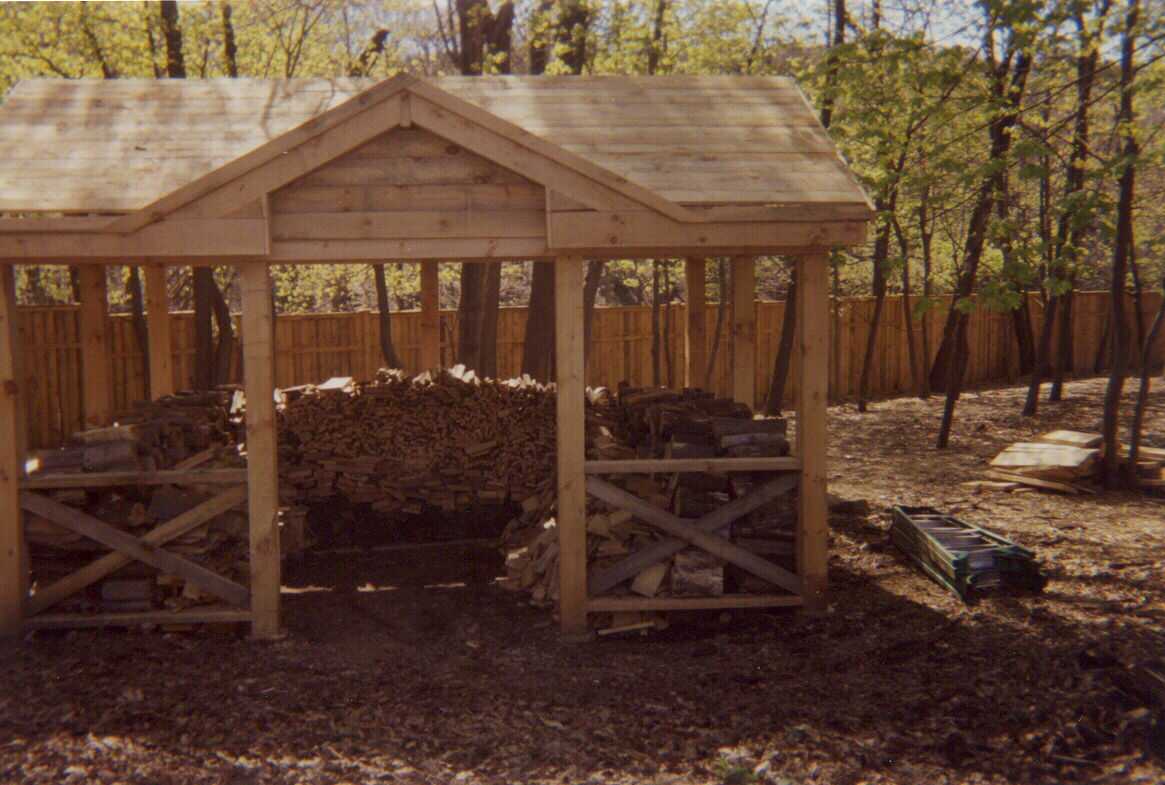 Upper mahogany, gazebo, wood shed, and stockade fence