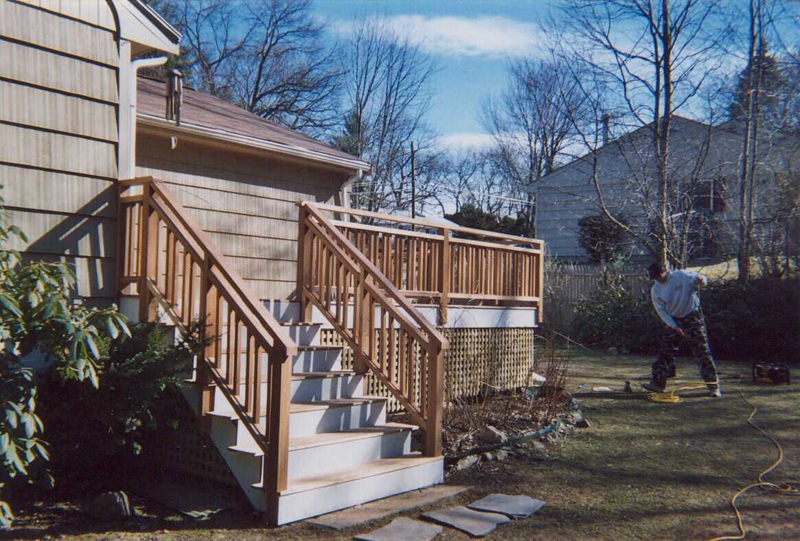 Simple mahogany with Pressure Treated square and lattice with gate below.