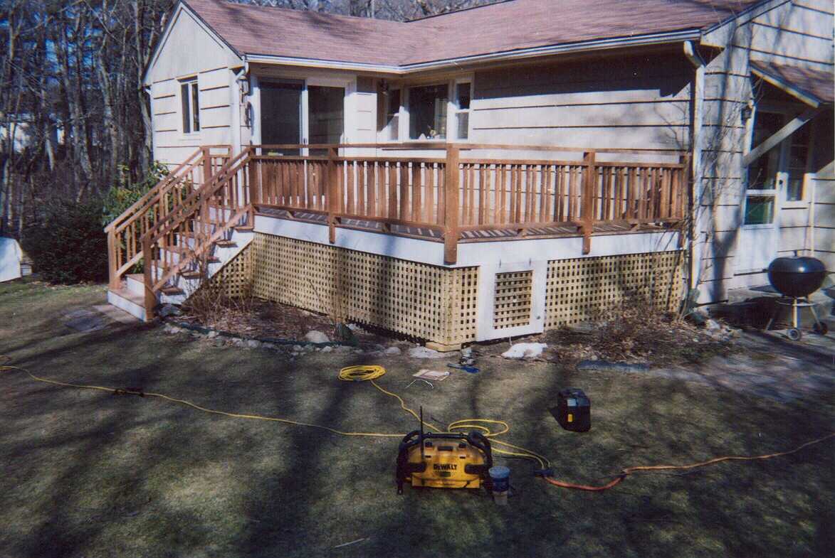 Simple mahogany with Pressure Treated square and lattice with gate below.