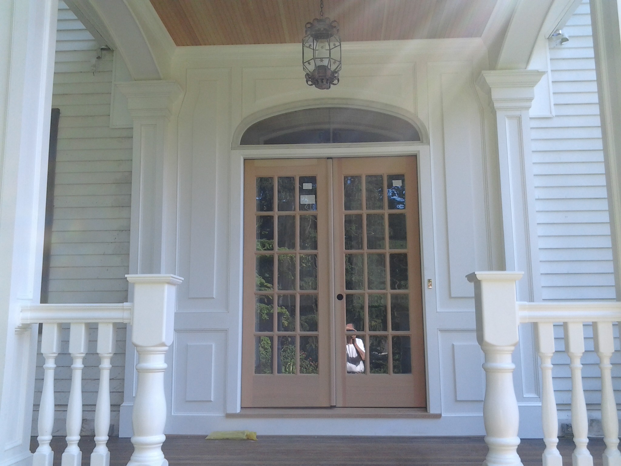 Front entry porch with custom raised panel work