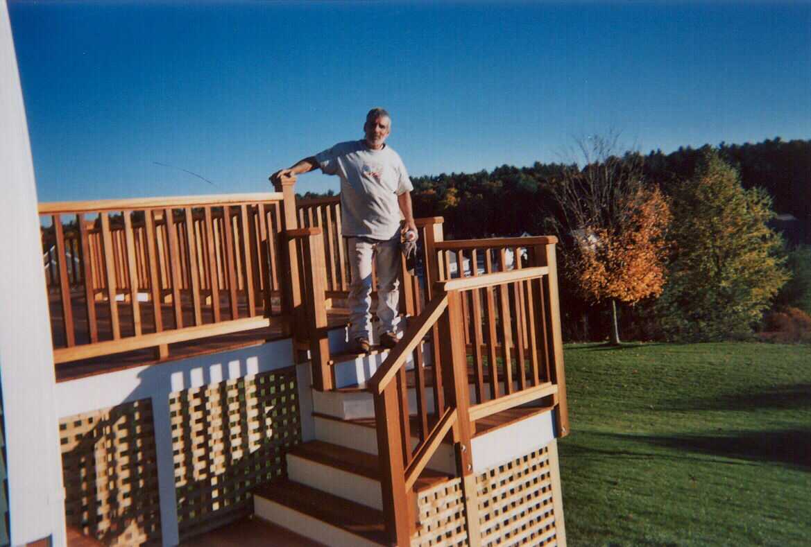 Beautiful mahogany with a bump, stair with turn and square Pressure Treated lattice below.