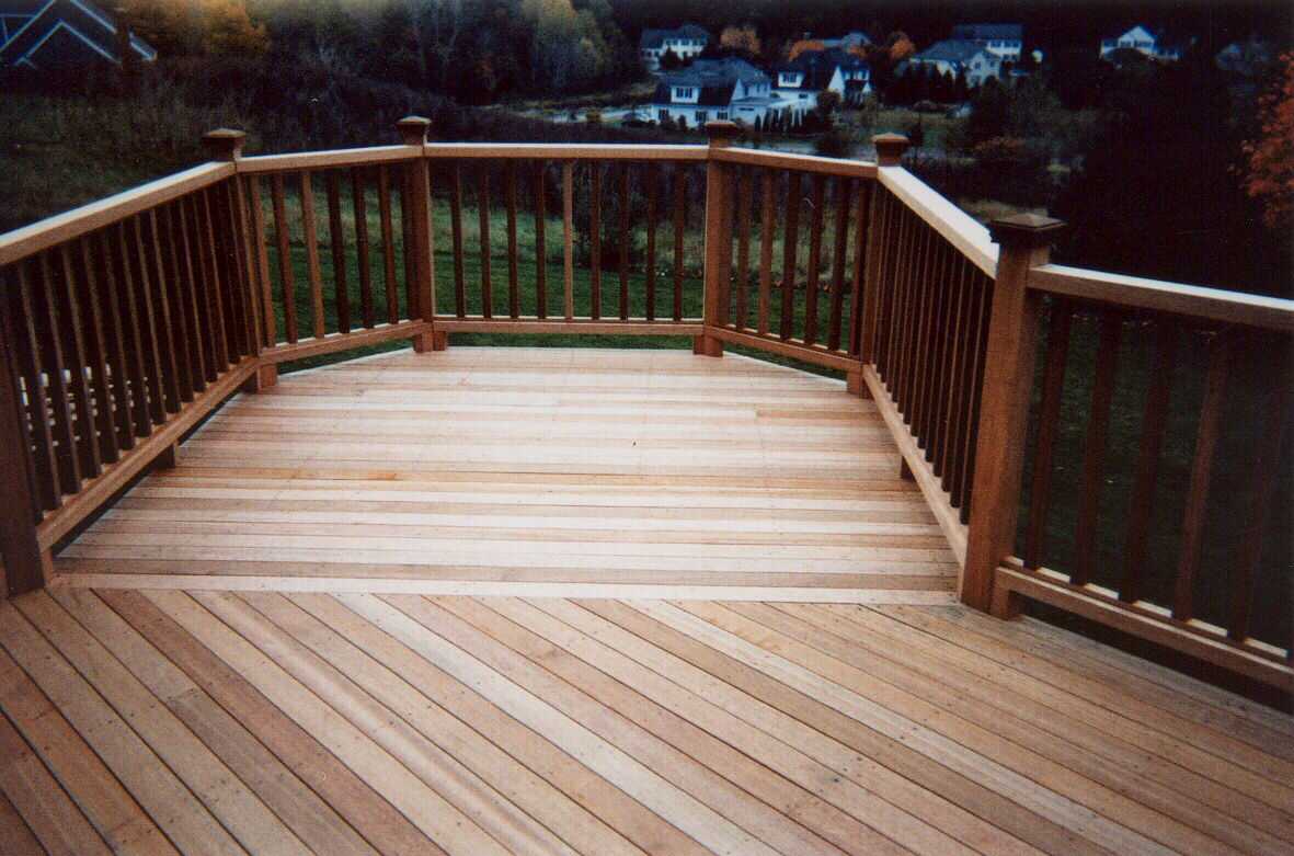 Beautiful mahogany with a bump, stair with turn and square Pressure Treated lattice below.