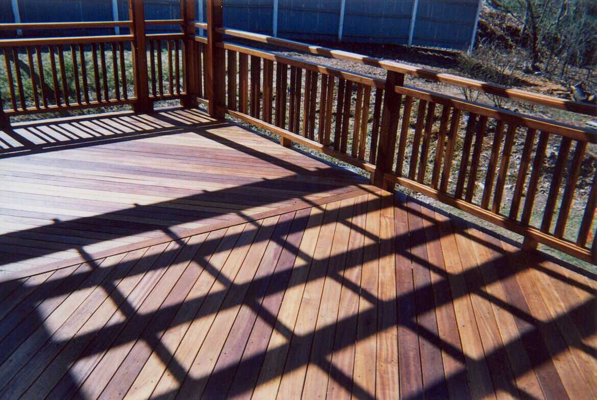 Pergolas, planters, benchwork, custom lattice and decking - all in mahogany