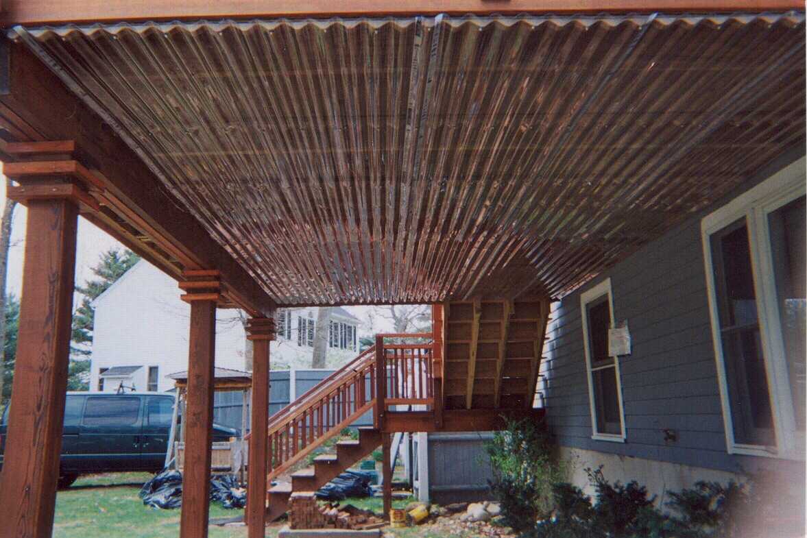 Mahogany with Pergola and rain guard below decks