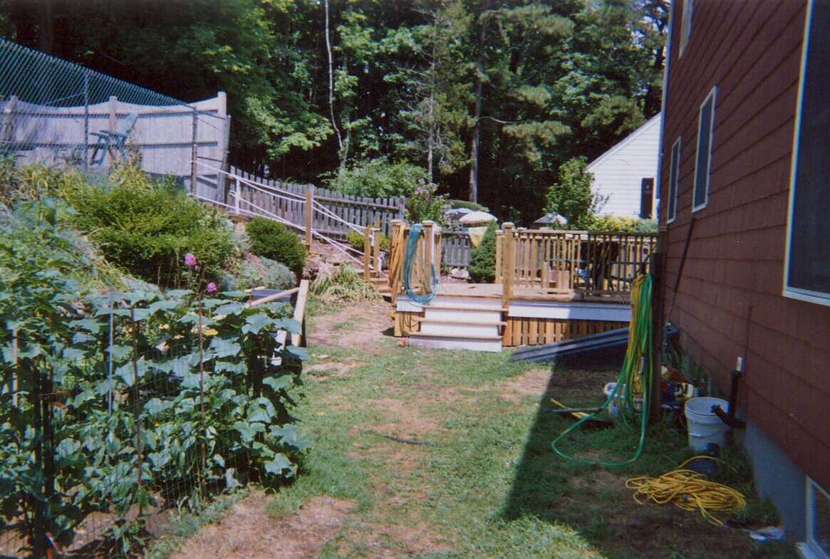 Deck with steps to pool above