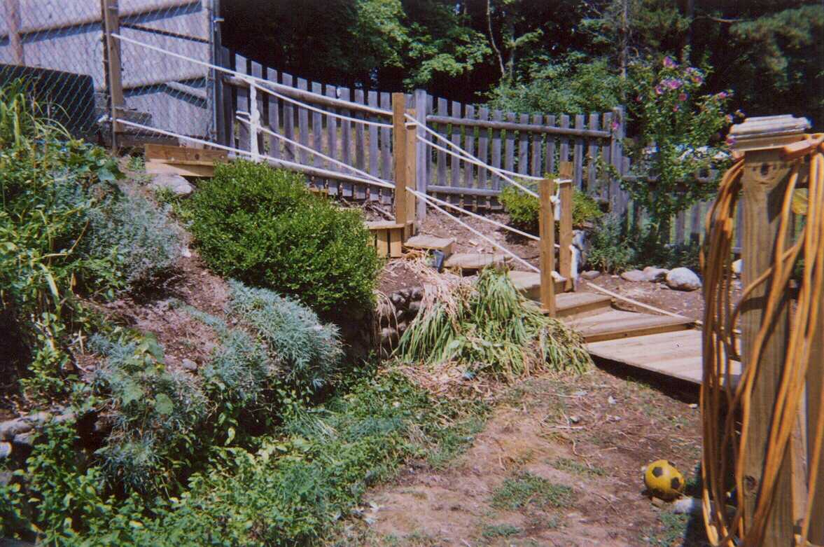 Deck with steps to pool above