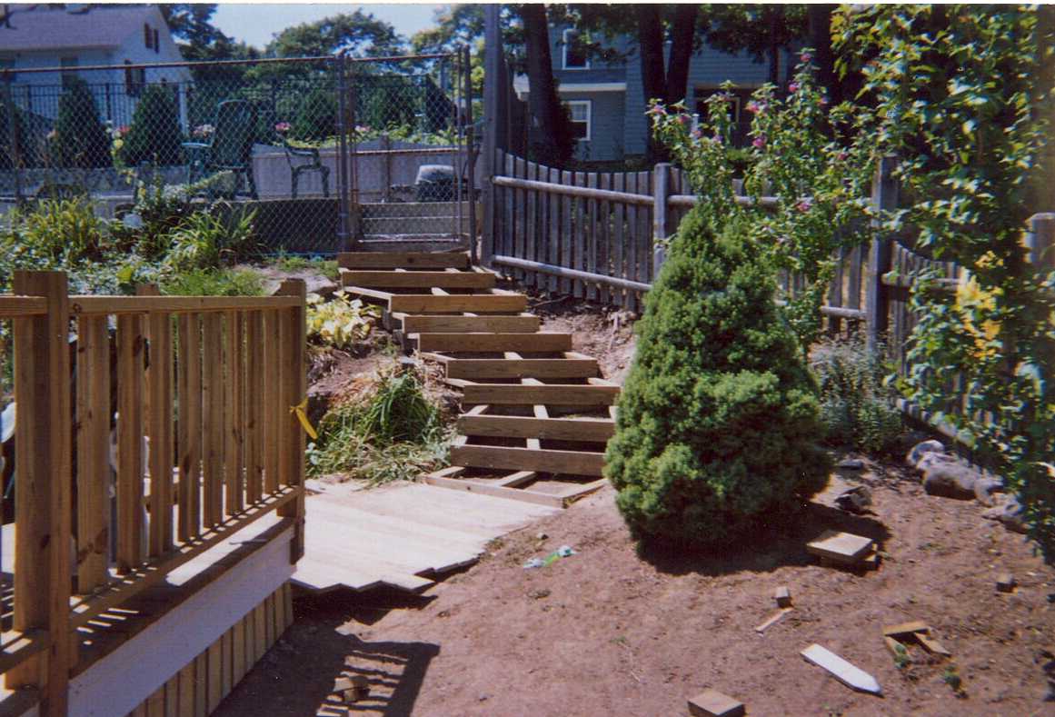 Deck with steps to pool above