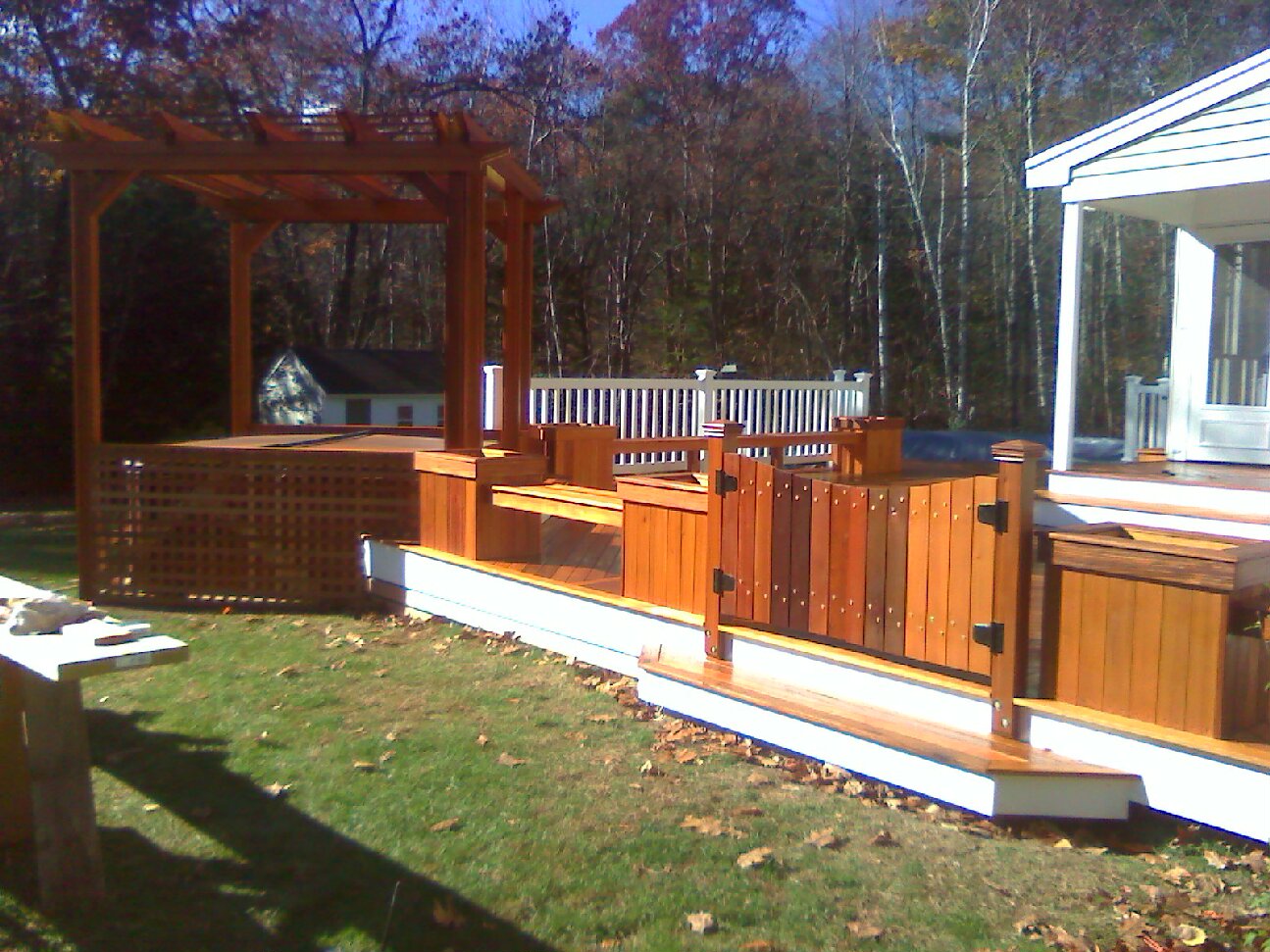 Mahogany Floor with Pergola and Hot Tub:  Vinyl Rails & Above Ground Pool;  Custom Benches, Flower Planters, & Gates (Townsend)