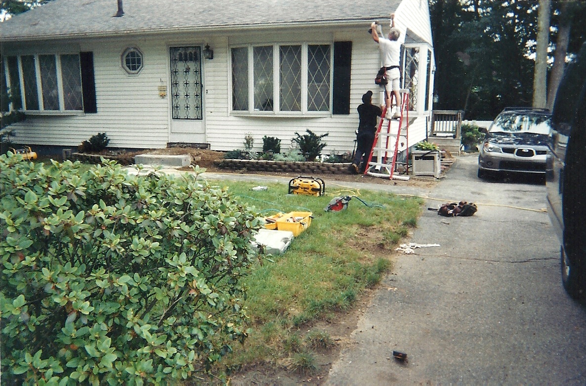 Custom Front & Side Entries with new Porches and Roofs