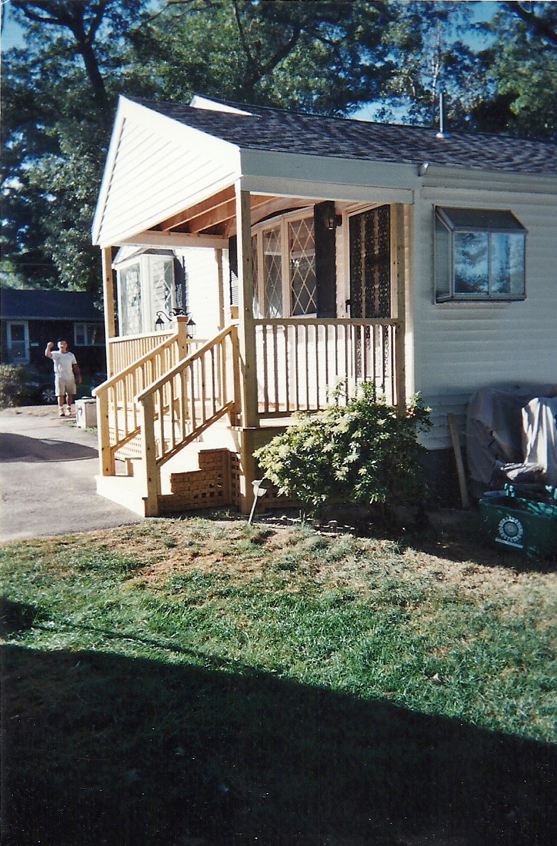 Custom Front & Side Entries with new Porches and Roofs